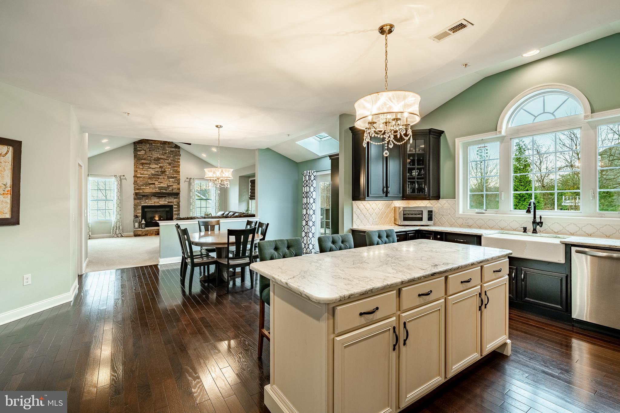 3000 Tyler Way Chalfont, PA 18914 - Photo 11 of 73 a open kitchen with a dining table chairs sink and granite counter tops