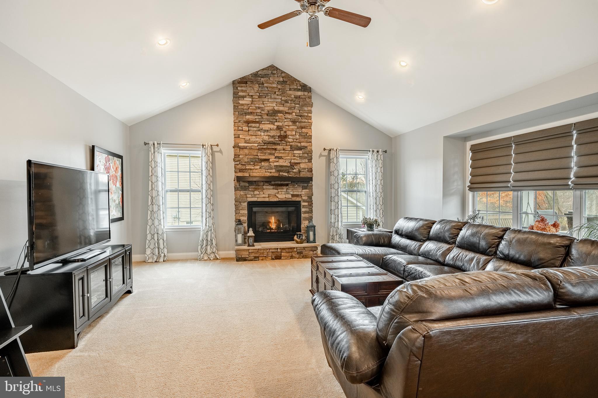3000 Tyler Way Chalfont, PA 18914 - Photo 15 of 73 a living room with furniture and a flat screen tv