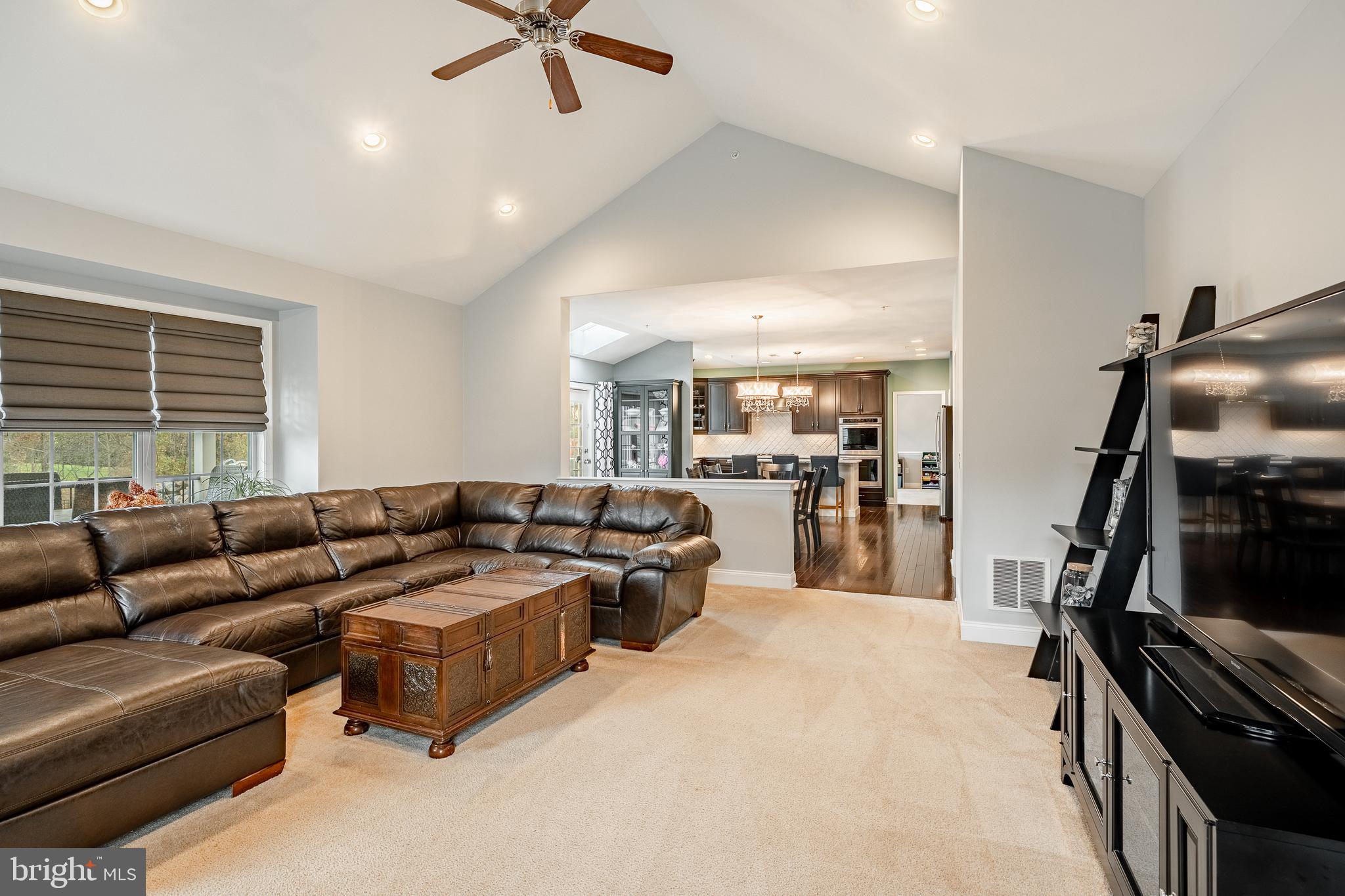 3000 Tyler Way Chalfont, PA 18914 - Photo 17 of 73 a living room with furniture and a flat screen tv