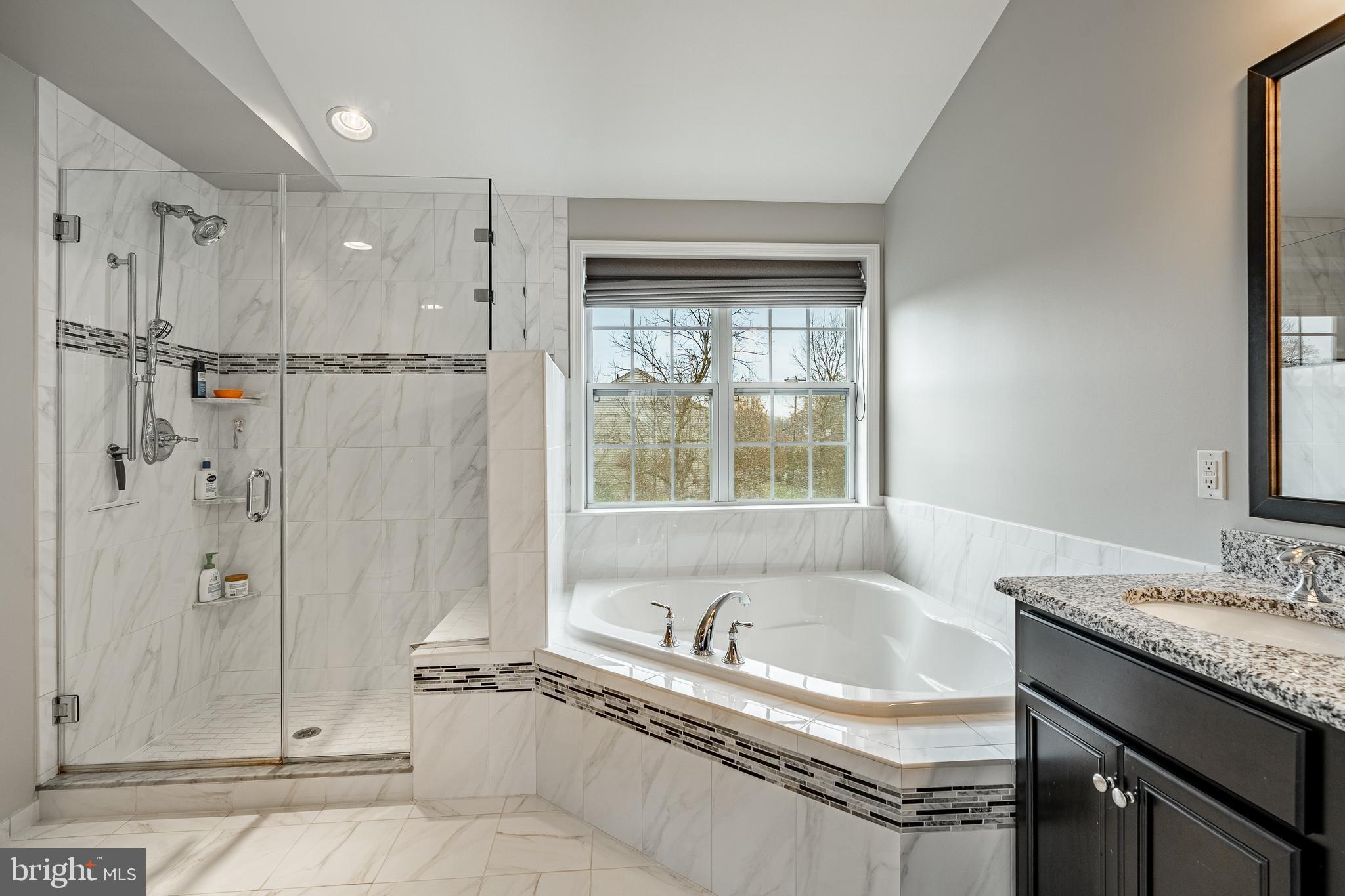 3000 Tyler Way Chalfont, PA 18914 - Photo 32 of 73 a bathroom with a granite countertop tub sink shower and mirror