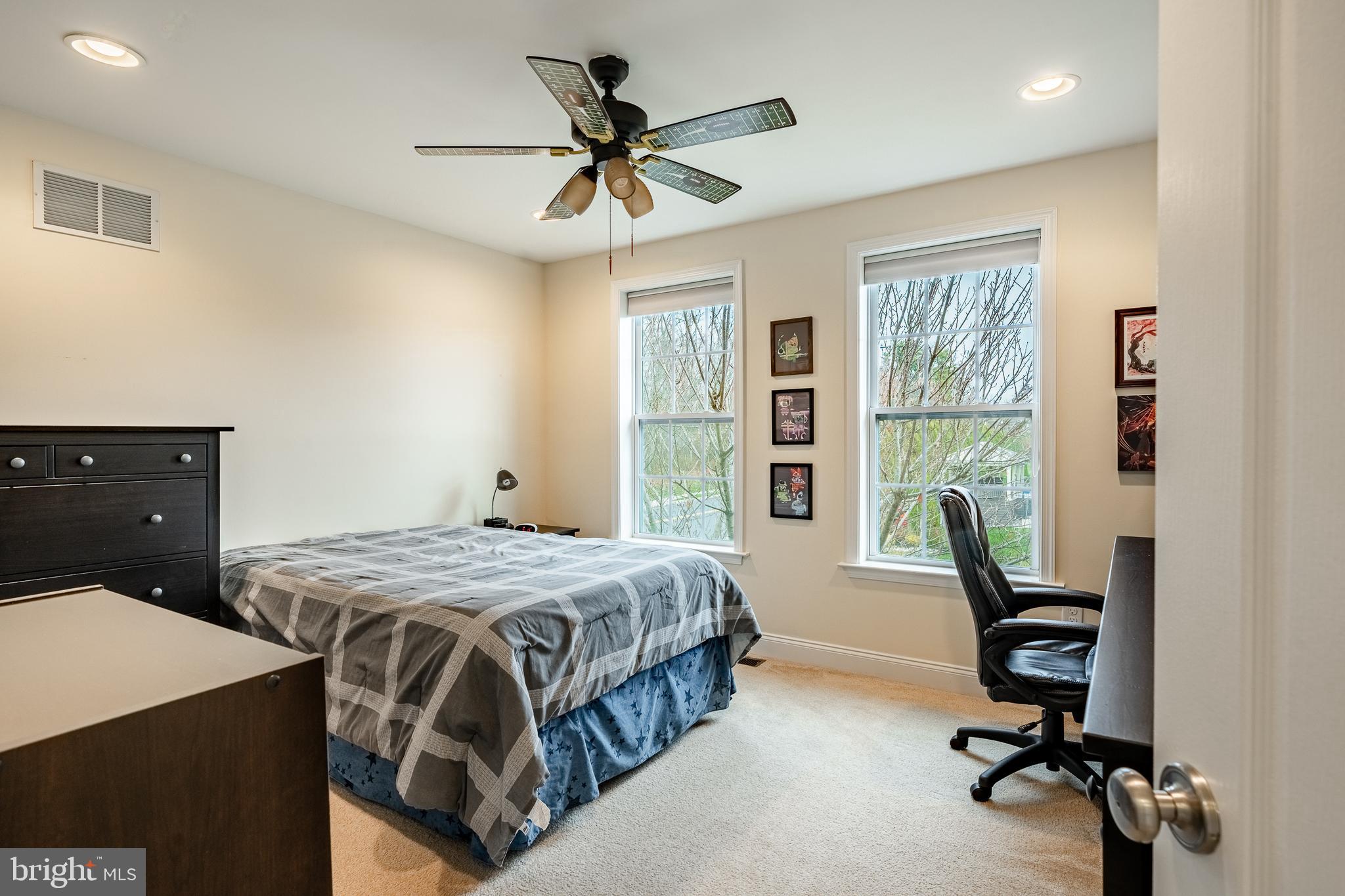 3000 Tyler Way Chalfont, PA 18914 - Photo 35 of 73 a bedroom with a bed a dresser and a window
