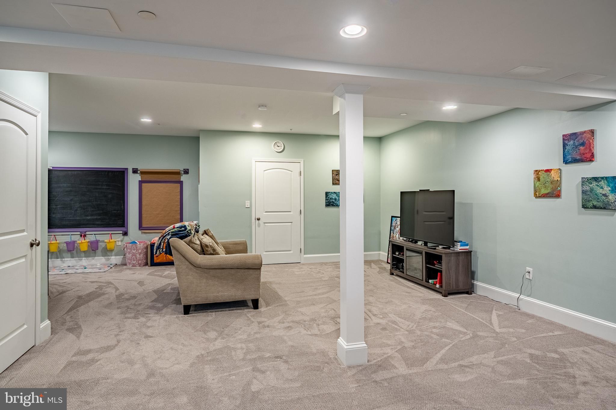 3000 Tyler Way Chalfont, PA 18914 - Photo 41 of 73 a living room with furniture and a flat screen tv