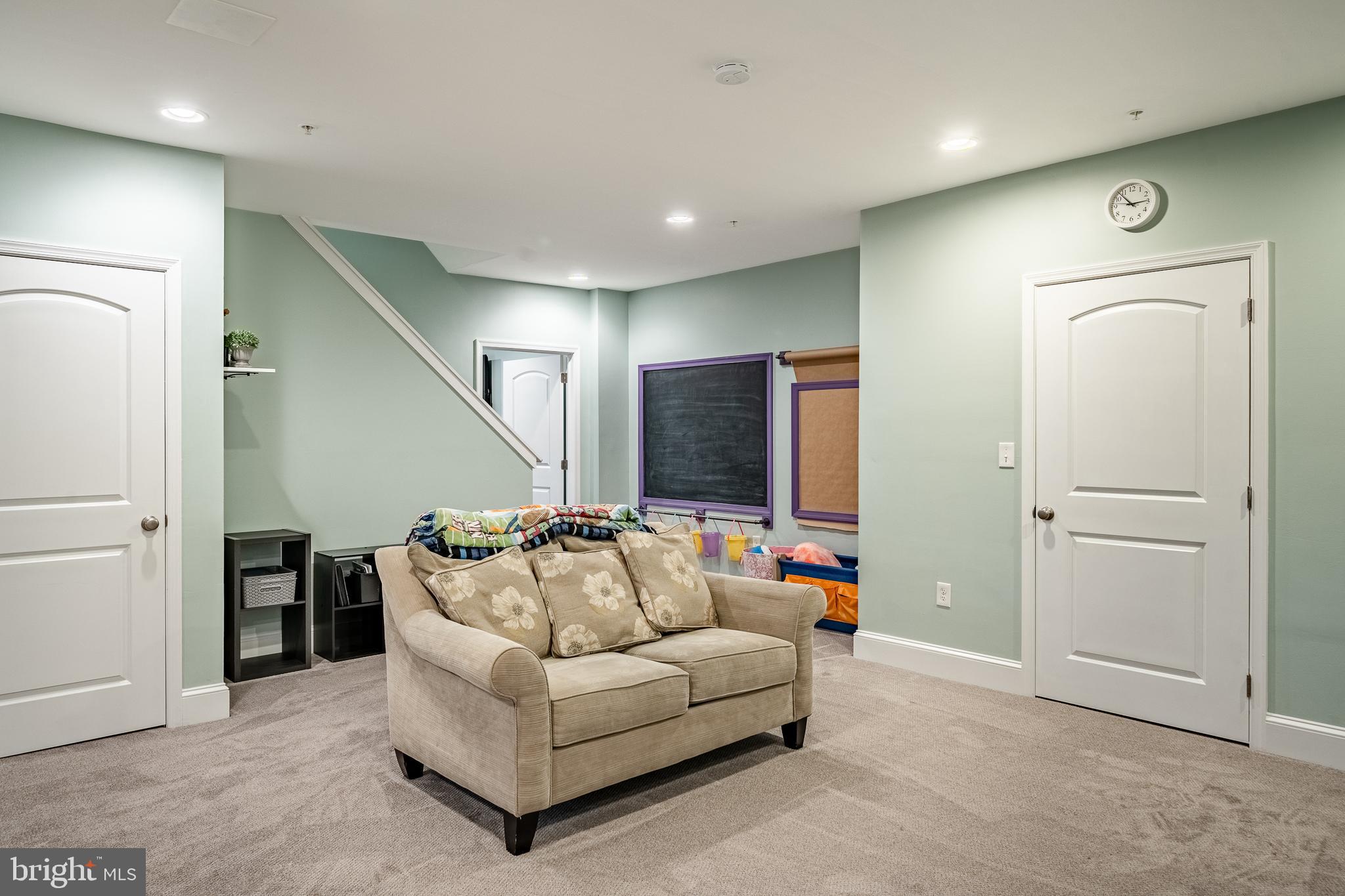 3000 Tyler Way Chalfont, PA 18914 - Photo 42 of 73 a living room with furniture and a flat screen tv