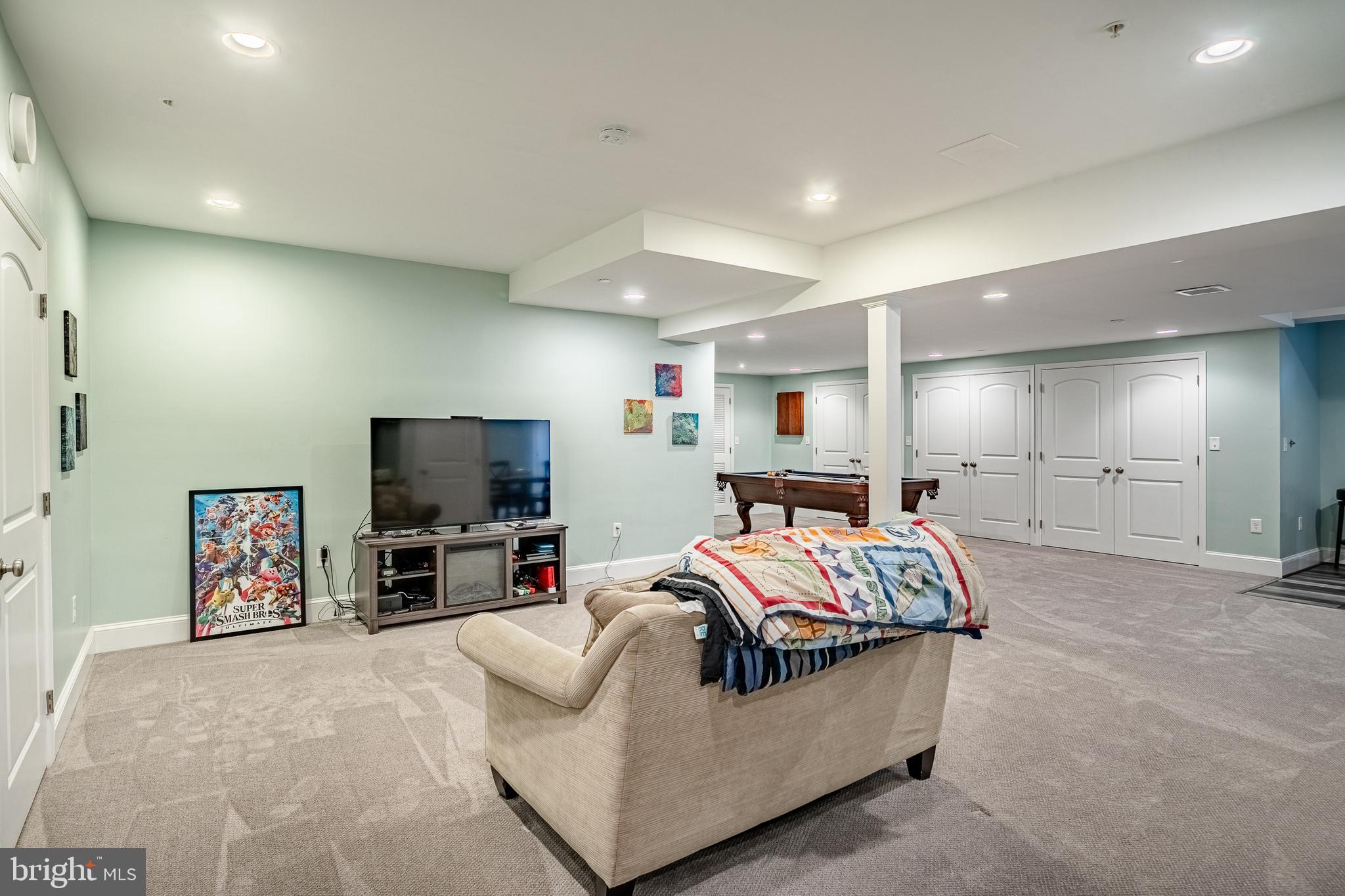 3000 Tyler Way Chalfont, PA 18914 - Photo 44 of 73 a spacious bedroom with a bed and a flat screen tv