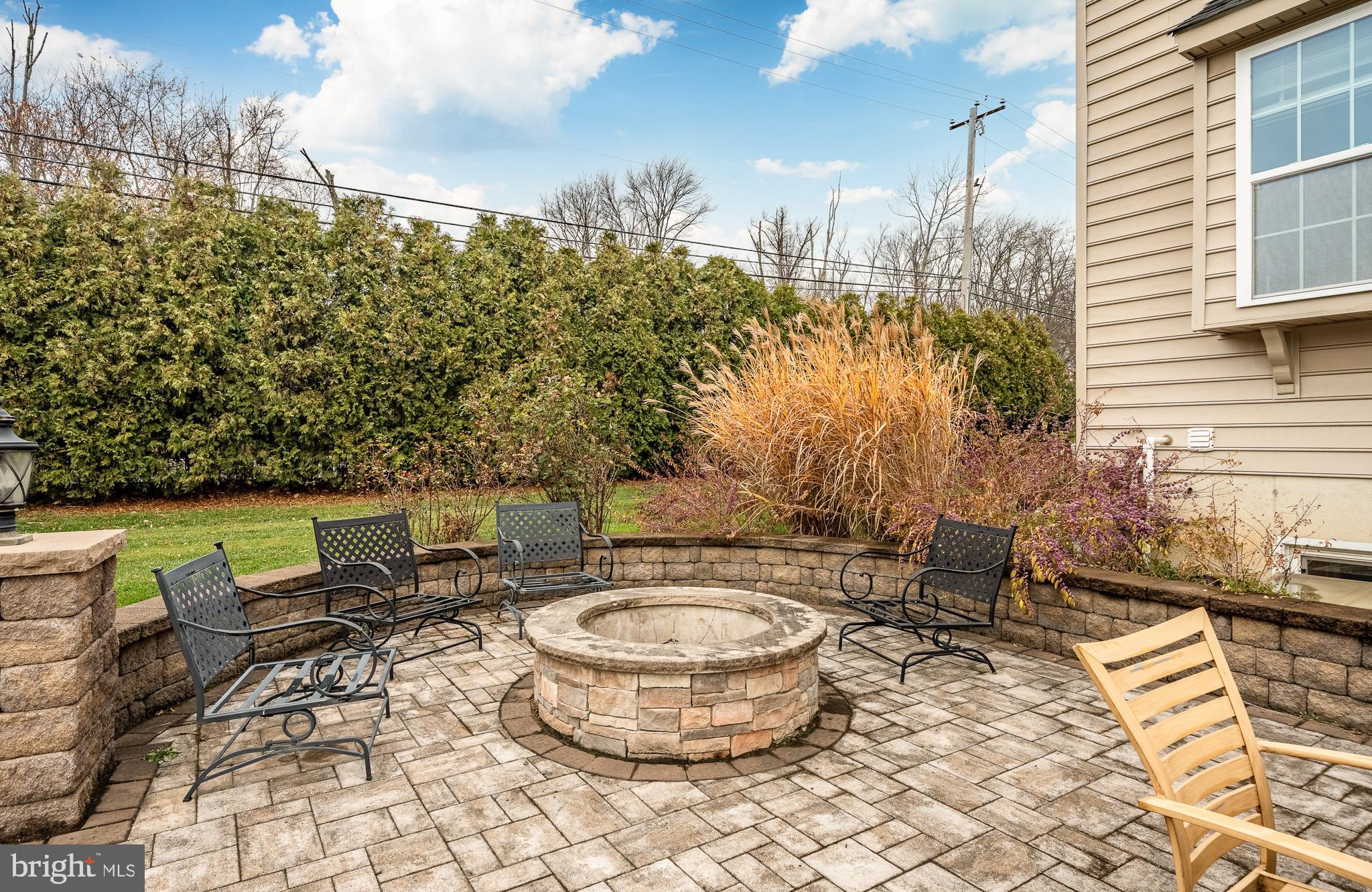 3000 Tyler Way Chalfont, PA 18914 - Photo 49 of 73 a view of a patio with table and chairs and potted plants