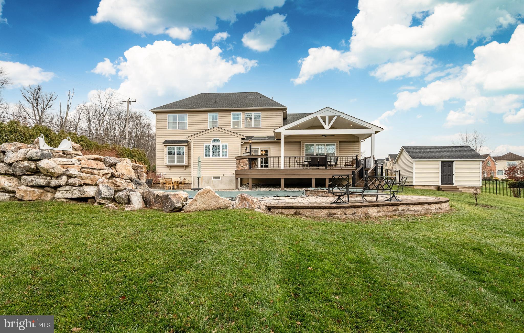 3000 Tyler Way Chalfont, PA 18914 - Photo 53 of 73 a front view of a house with a garden and plants