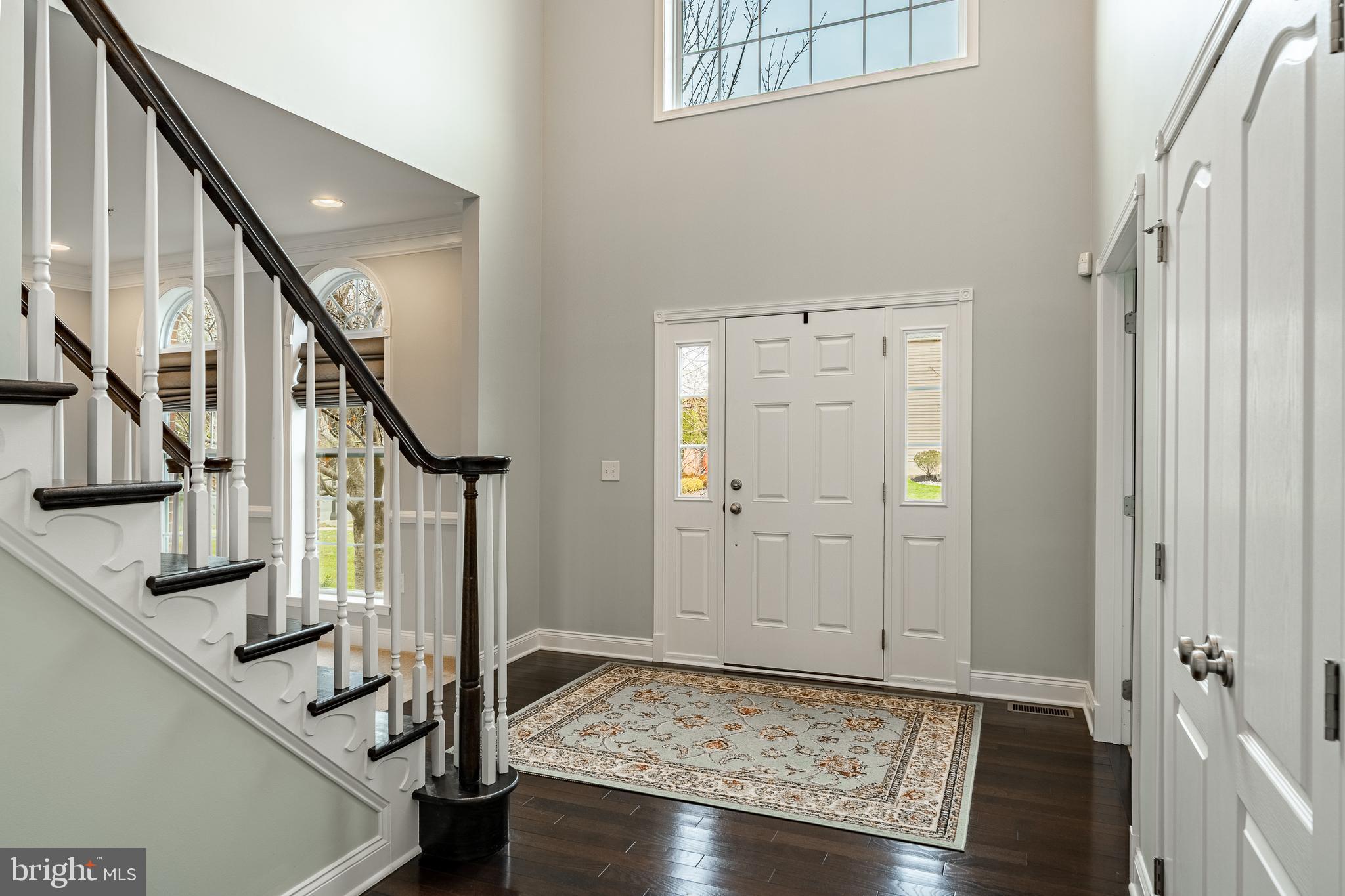 3000 Tyler Way Chalfont, PA 18914 - Photo 6 of 73 a view of an entryway with wooden floor and staircase