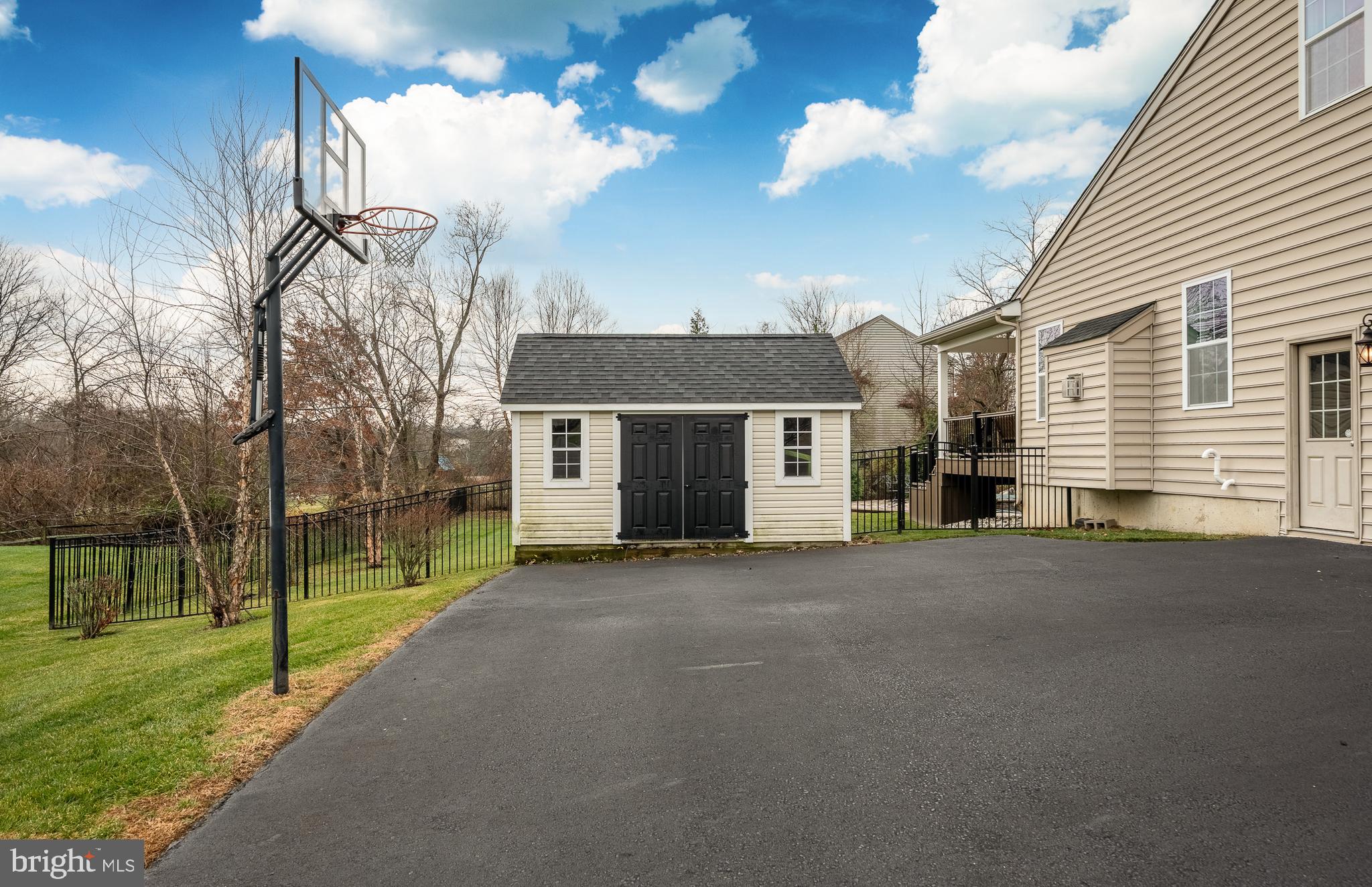 3000 Tyler Way Chalfont, PA 18914 - Photo 61 of 73 a front view of a house with a yard and garage