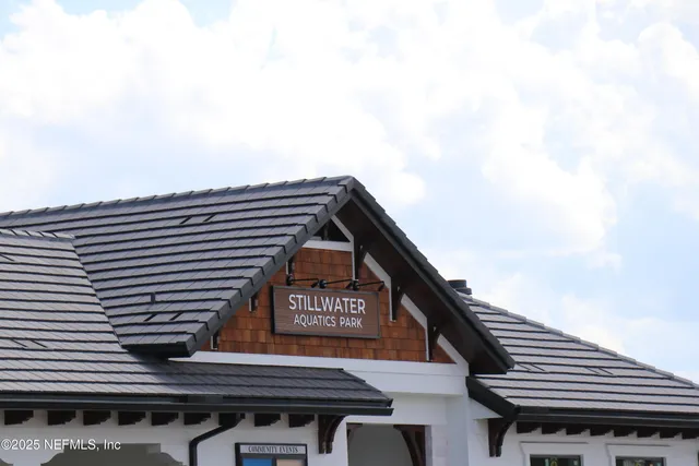 an aerial view of houses with outdoor space