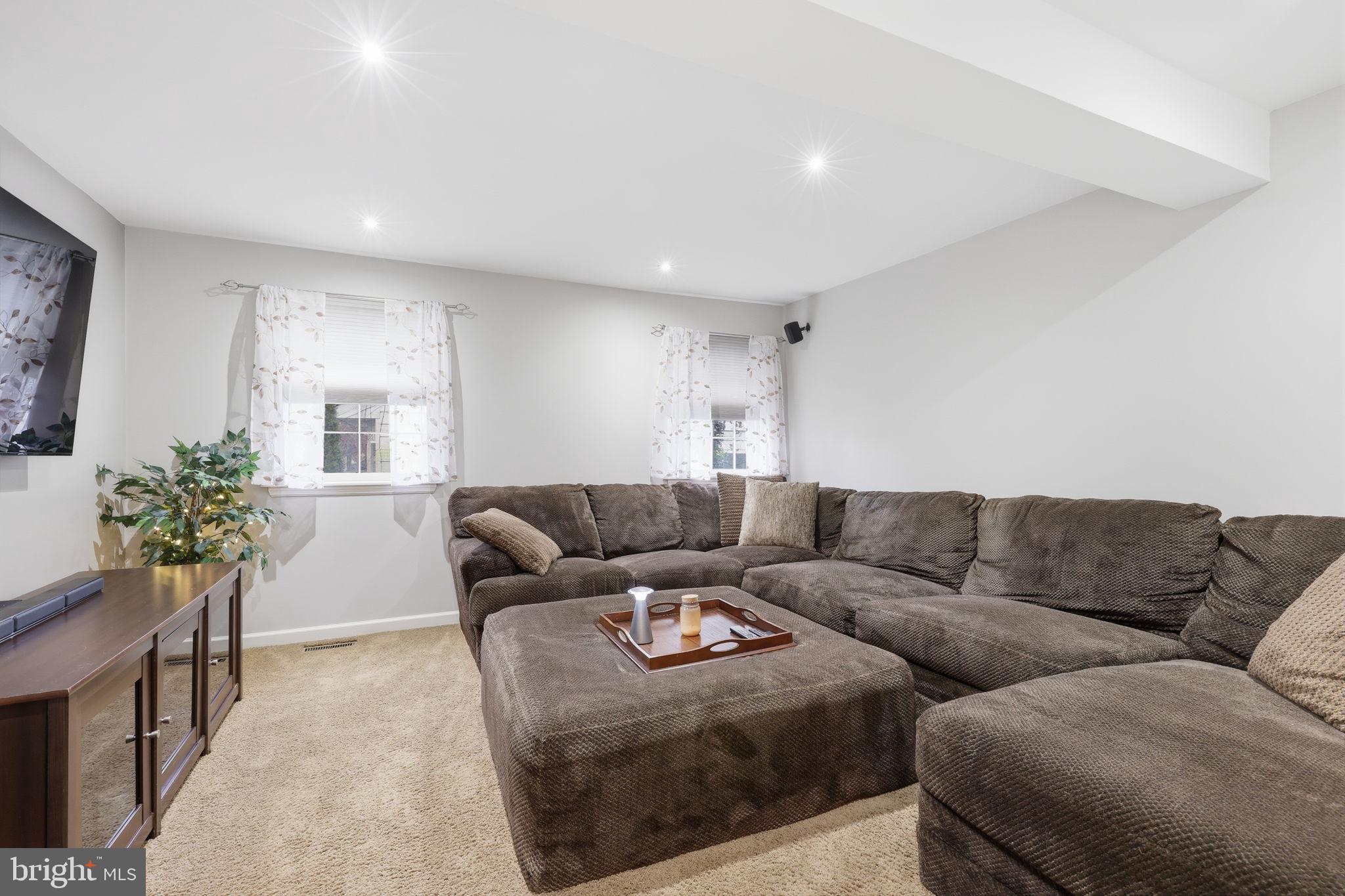 1607 Forrest Avenue Feasterville-Trevose, PA 19053 - Photo 20 of 48 a living room with furniture and a couch