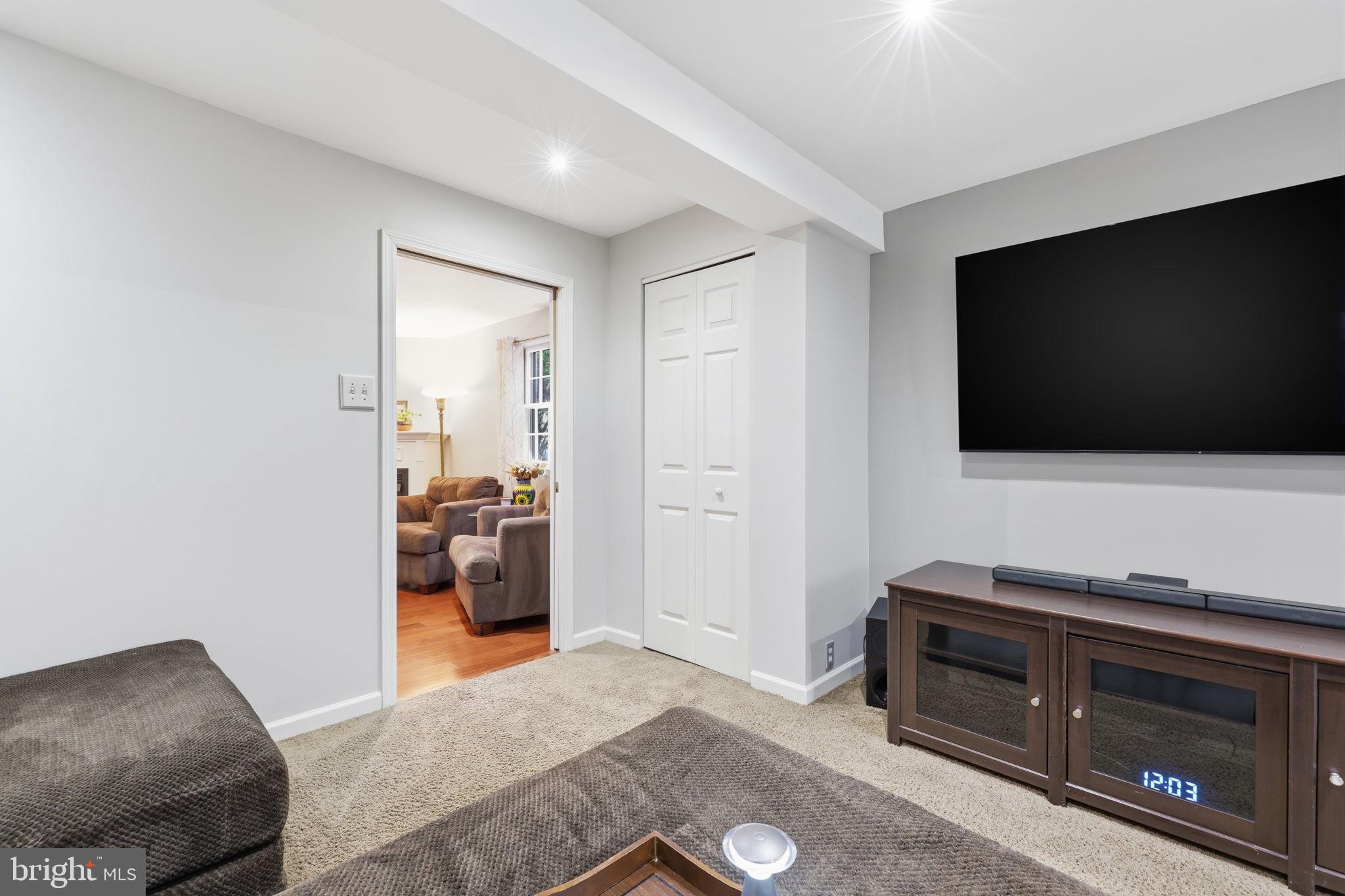 1607 Forrest Avenue Feasterville-Trevose, PA 19053 - Photo 21 of 48 a living room with furniture and a flat screen tv