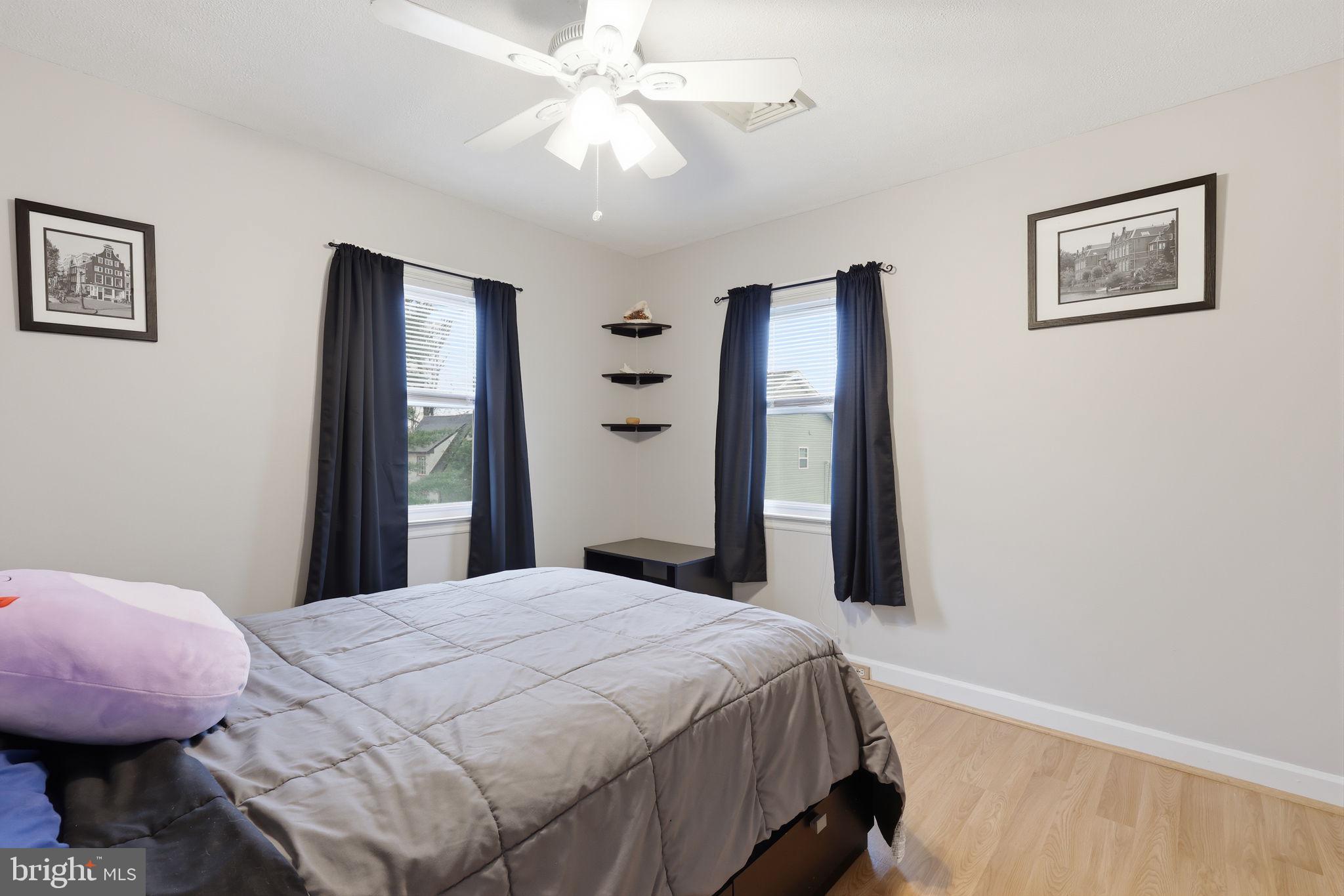 1607 Forrest Avenue Feasterville-Trevose, PA 19053 - Photo 25 of 48 a bedroom with a bed dresser and a window