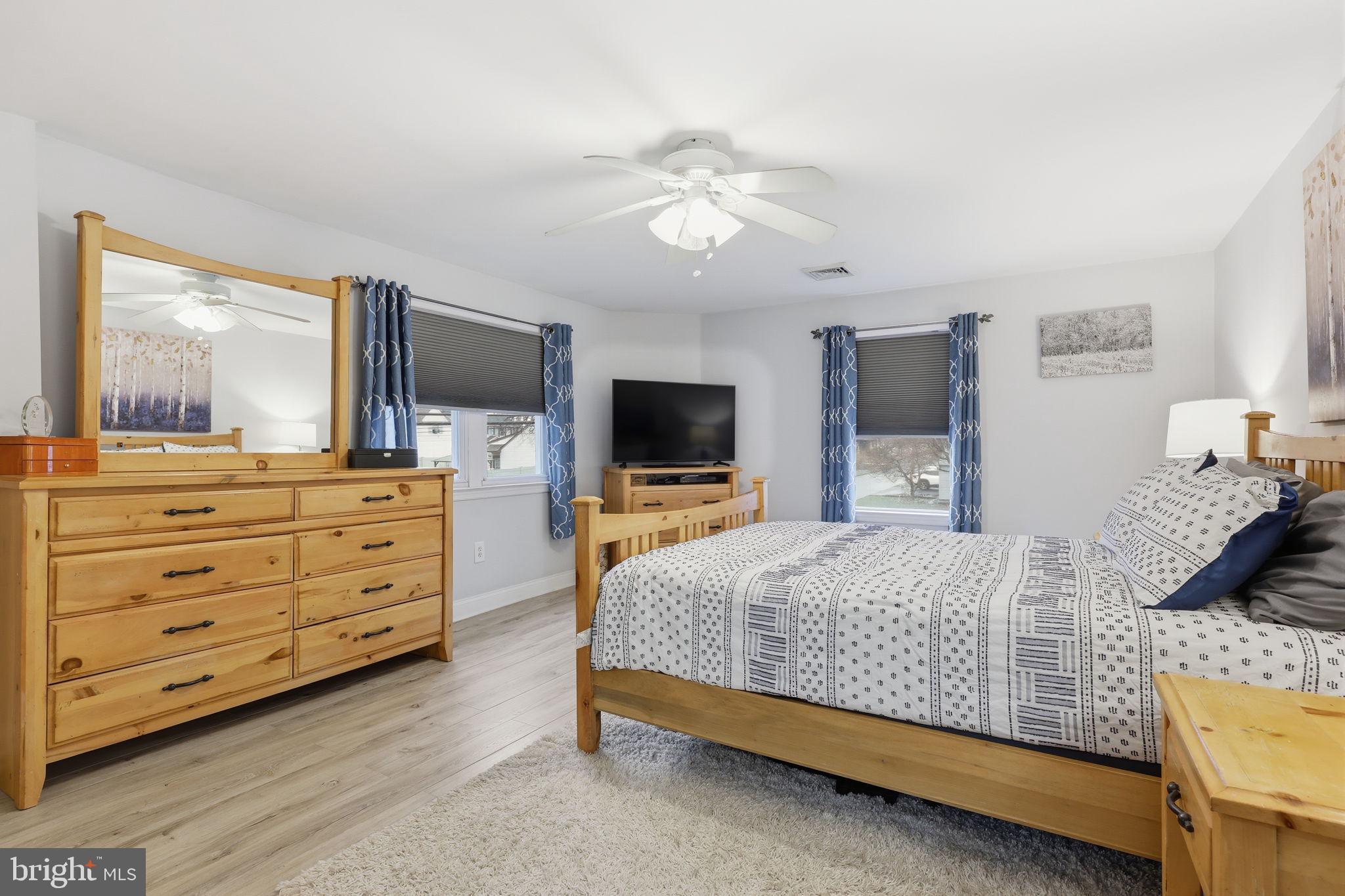 1607 Forrest Avenue Feasterville-Trevose, PA 19053 - Photo 28 of 48 a bedroom with a bed and a flat screen tv