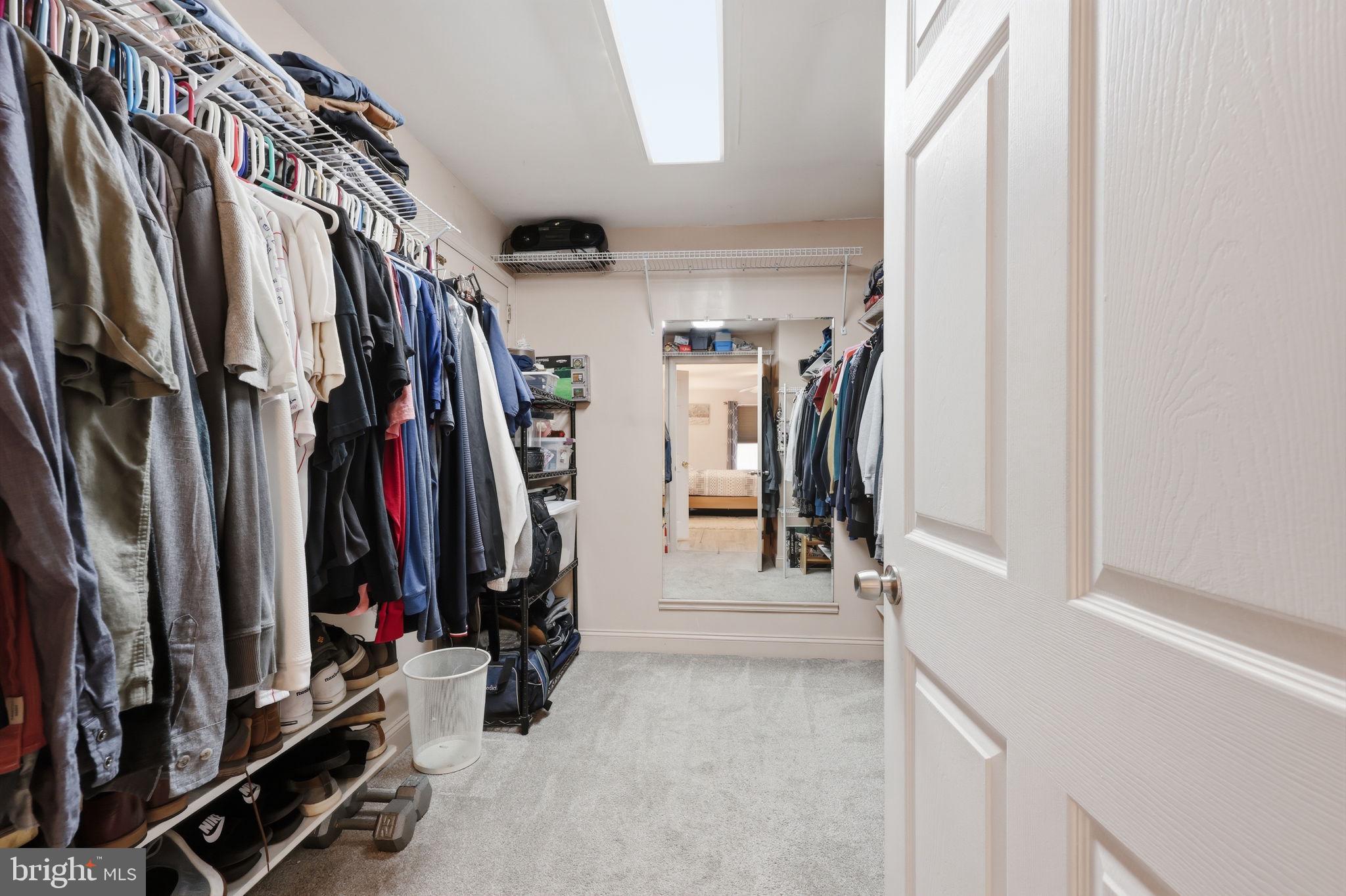 1607 Forrest Avenue Feasterville-Trevose, PA 19053 - Photo 30 of 48 a view of walk in closet with clothes