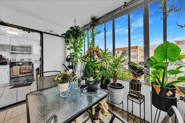 a bathroom with a sink toilet vanity and shower