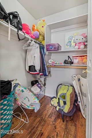 a bedroom with a bed and a view of bathroom