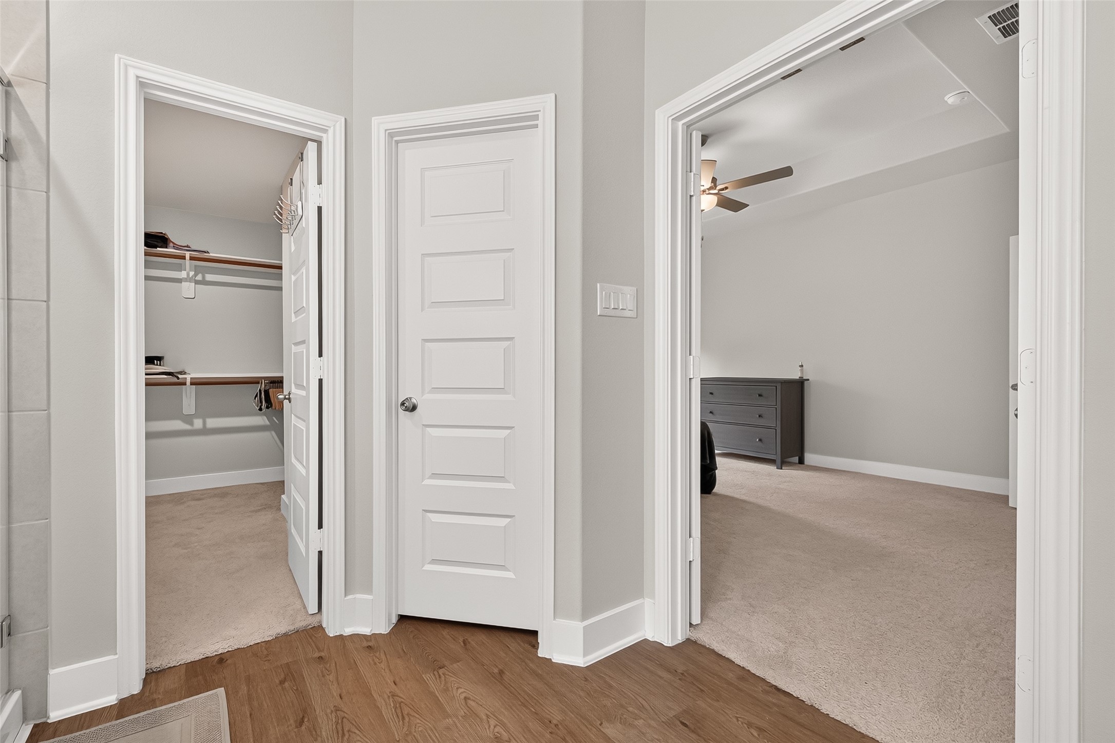 4004 Baja Lane Houston, TX 77045 - Photo 23 of 34 This immaculate hallway highlights a smooth flow from durable flooring to cozy bedroom carpeting. Complemented by fresh neutral tones and sharp contemporary details, it provides an organized and stylish entry point to your private suite and closet space.