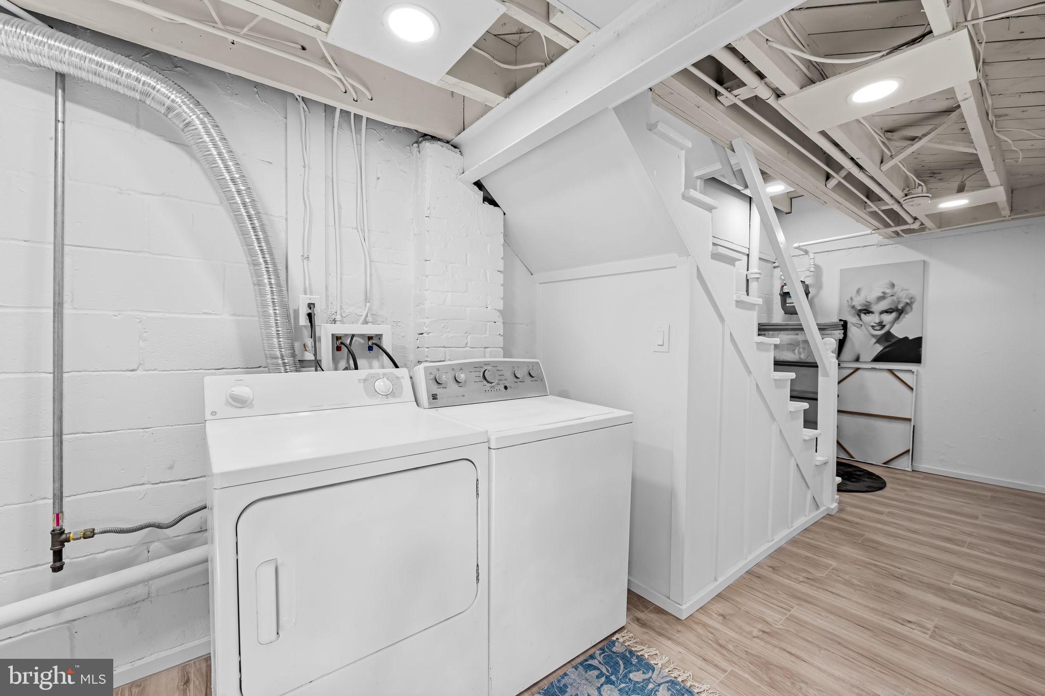 66 Stemmers Run Road Baltimore, MD 21221 - Photo 15 of 24 a utility room with dryer and washer