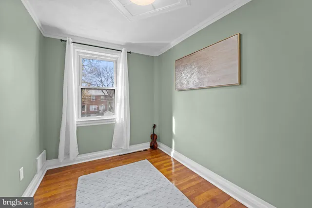 a bedroom with bed and window