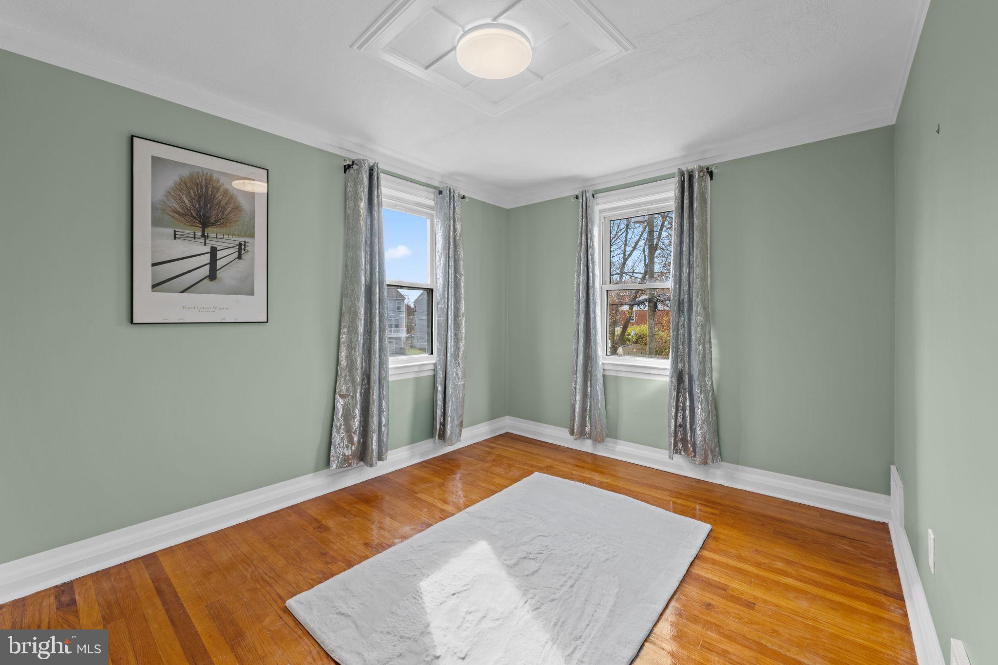 66 Stemmers Run Road Baltimore, MD 21221 - Photo 18 of 24 a view of a big room with windows and closet