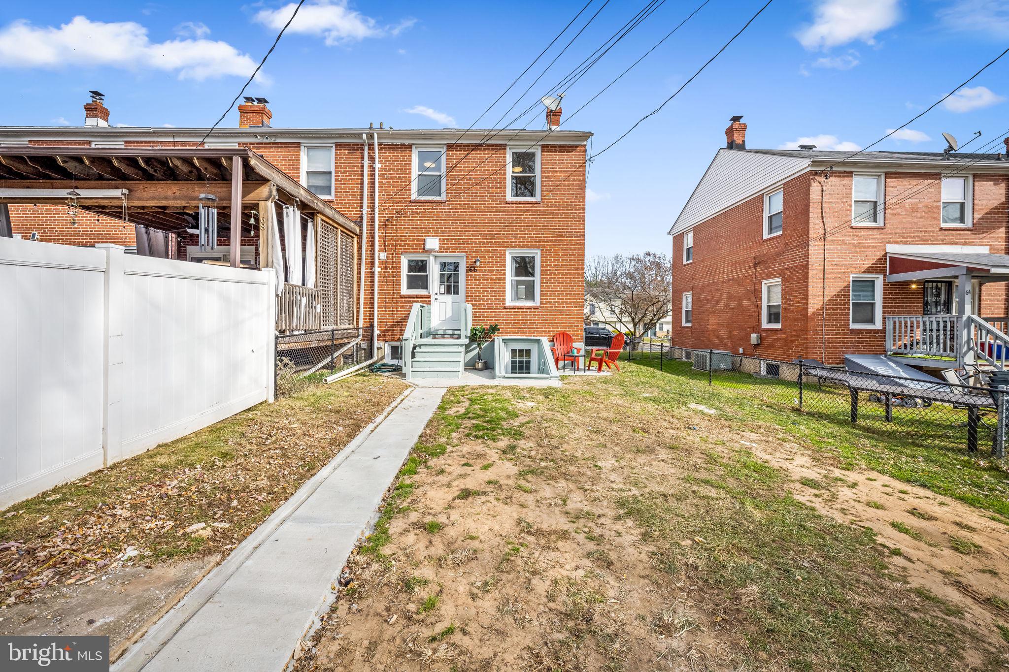 66 Stemmers Run Road Baltimore, MD 21221 - Photo 24 of 24 a view of a house with a yard