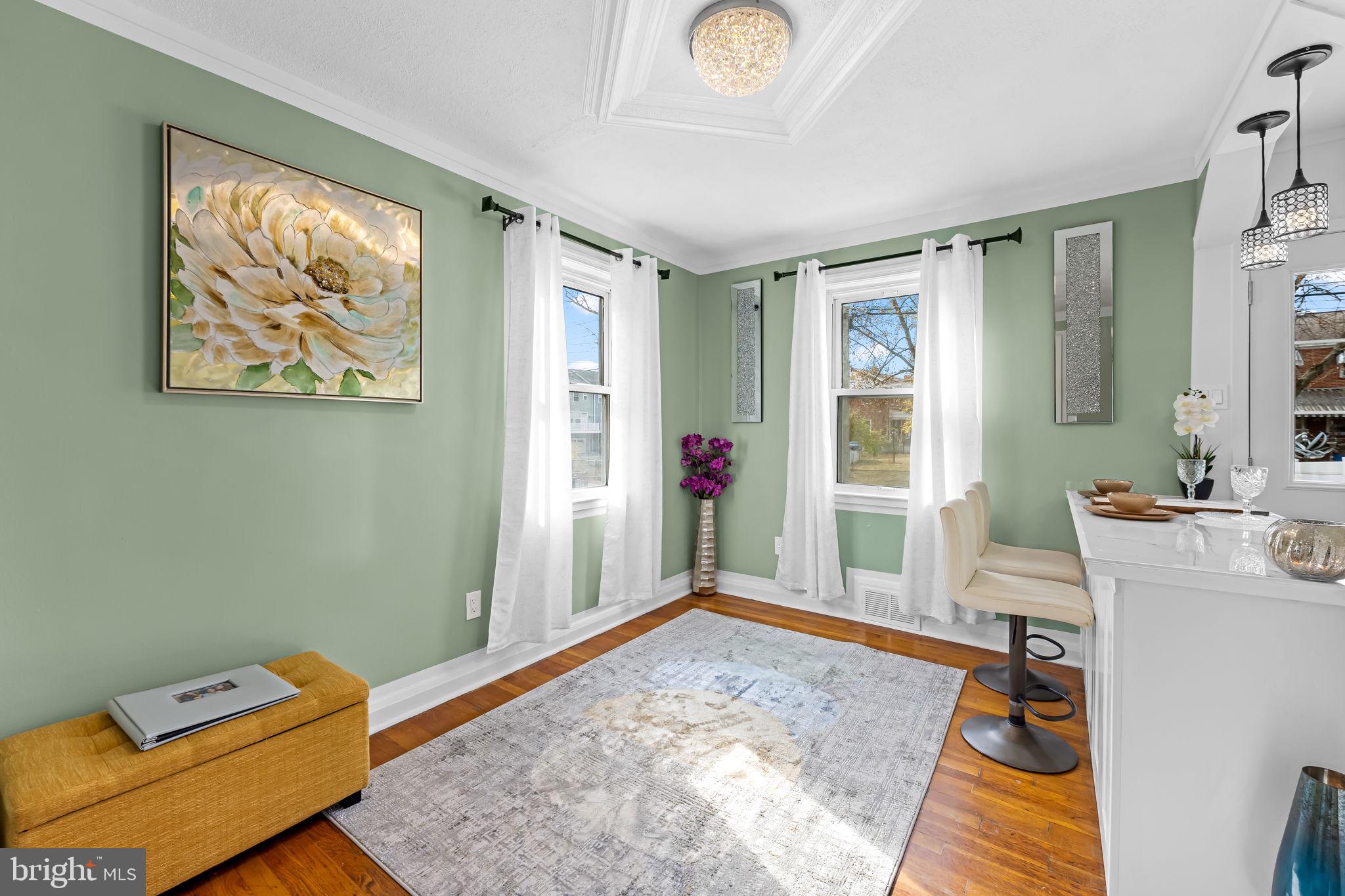 66 Stemmers Run Road Baltimore, MD 21221 - Photo 8 of 24 a bedroom with furniture and a window