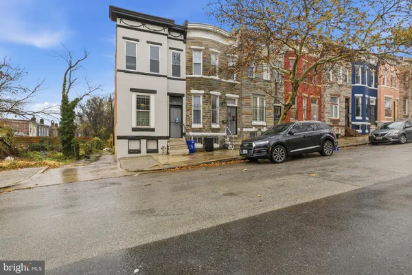 a cars parked in front of a building
