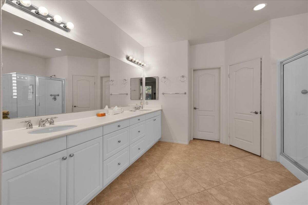 3467 Savanna Way Palm Springs, CA 92262 - Photo 21 of 49 a spacious bathroom with a double vanity sink mirror and shower