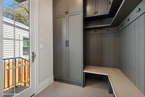 a bathroom with a tub and a window