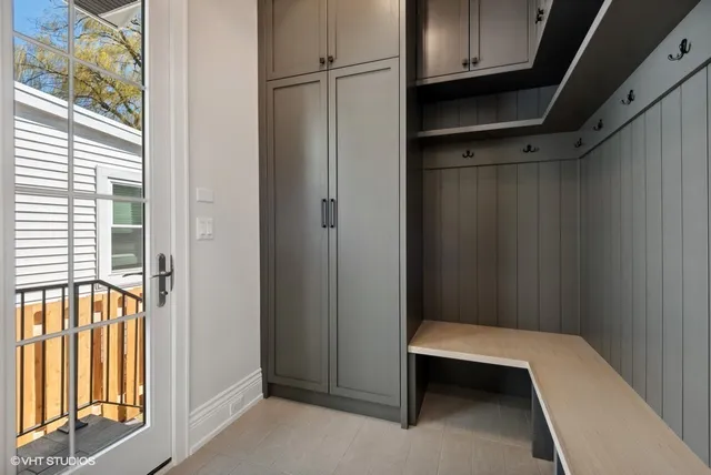 a bathroom with a tub and a window