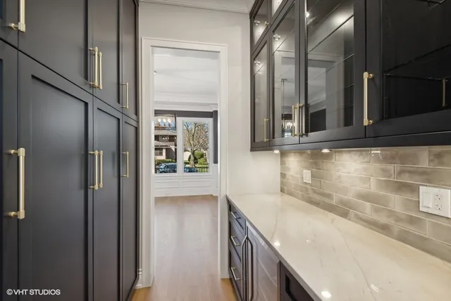 a bathroom with a bathtub and a sink