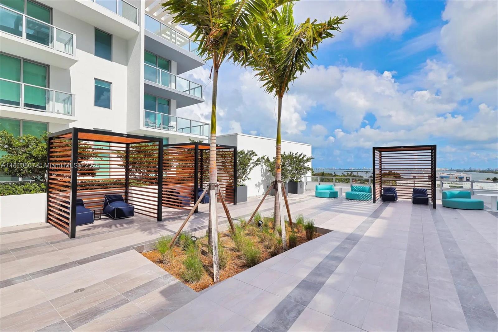 3900 Biscayne Boulevard, Unit S218 Miami, FL 33137 - Photo 19 of 36 a view of a backyard with a patio