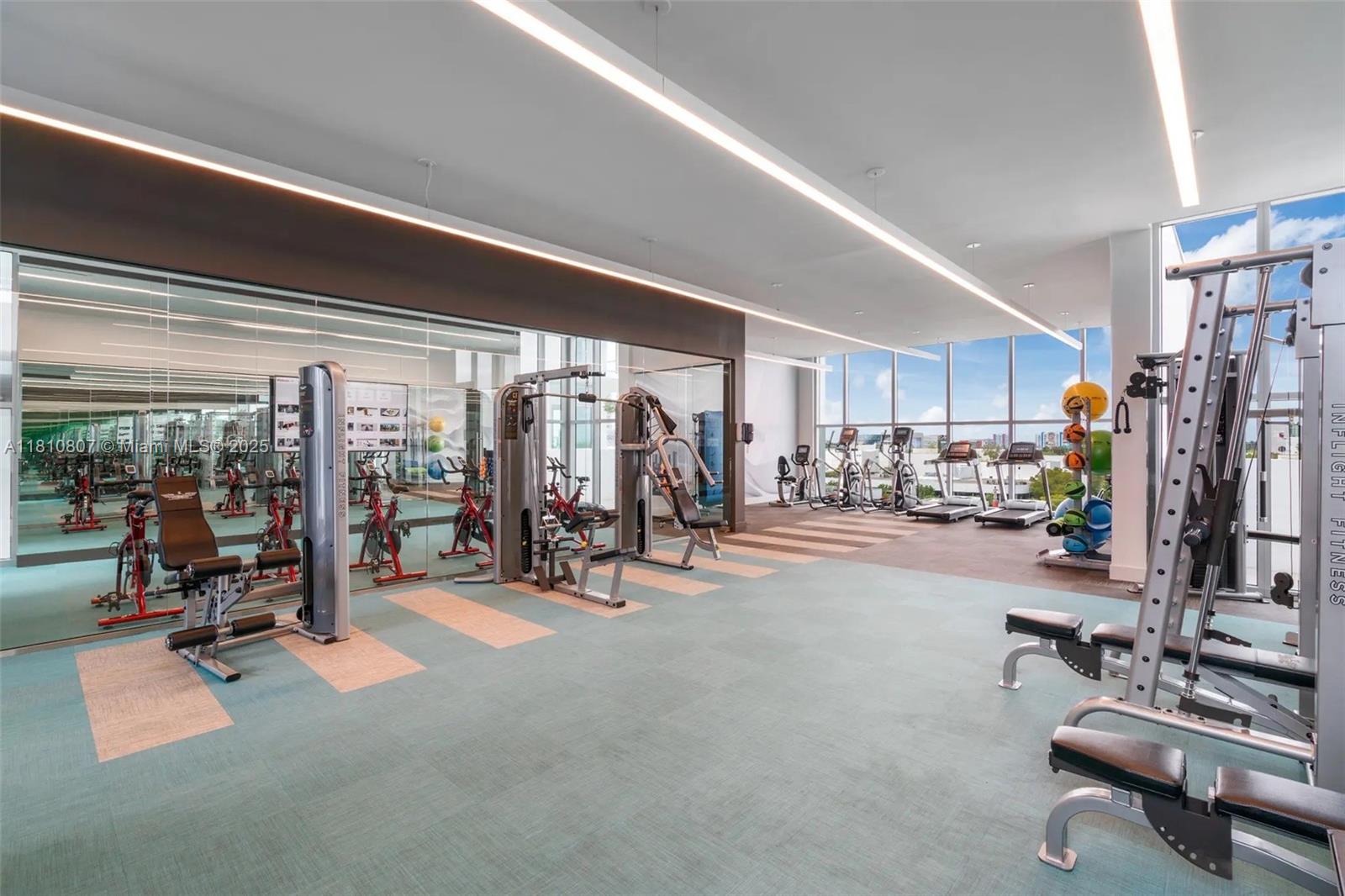 3900 Biscayne Boulevard, Unit S218 Miami, FL 33137 - Photo 29 of 36 a view of a room with gym equipment