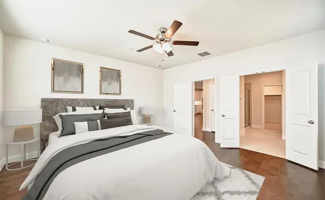 a room with furniture and a potted plant