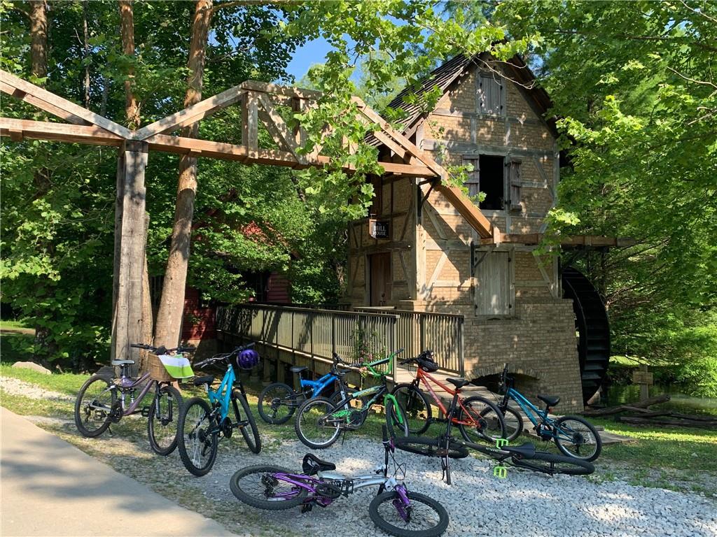 0 Maple Hill Lane Chickamauga, GA 30707 - Photo 22 of 39 a front view of a house with patio furniture and garden