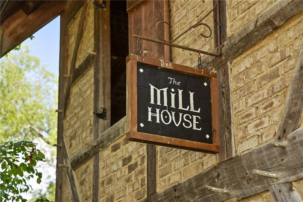 0 Maple Hill Lane Chickamauga, GA 30707 - Photo 23 of 39 a street sign on a brick wall