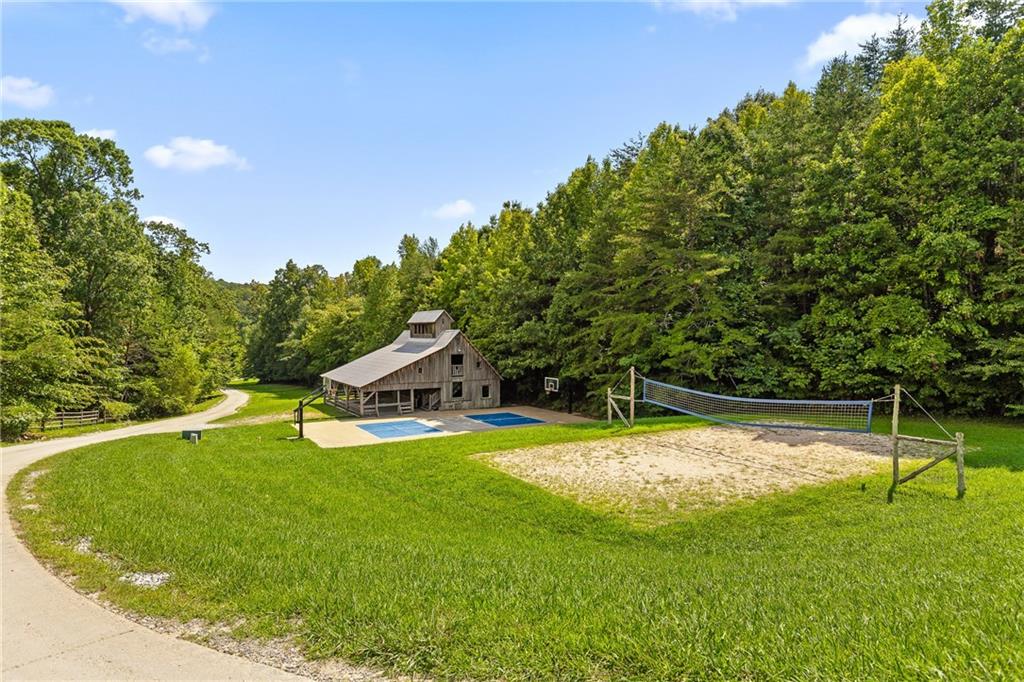 0 Maple Hill Lane Chickamauga, GA 30707 - Photo 31 of 39 a swimming pool with lots of tress in the background