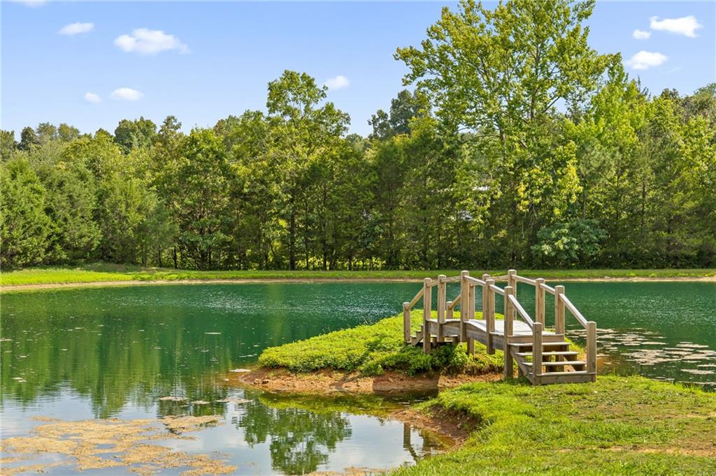 0 Maple Hill Lane Chickamauga, GA 30707 - Photo 5 of 39 a view of a lake with a yard