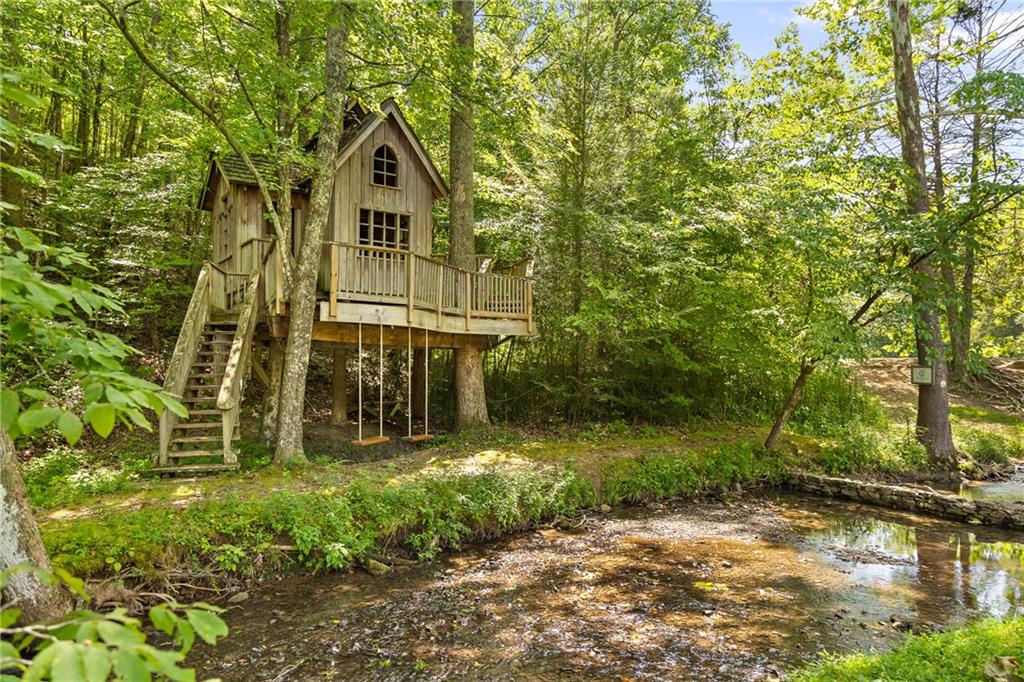 0 Maple Hill Lane Chickamauga, GA 30707 - Photo 9 of 39 a front view of a house with a yard