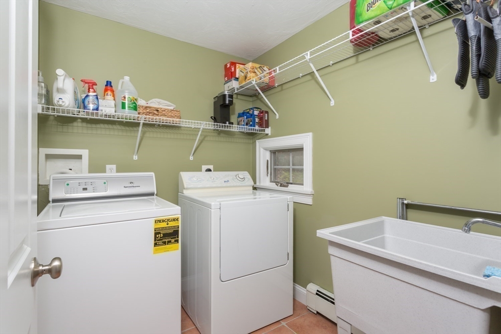 1 Delta Drive Franklin, MA 02038 - Photo 18 of 42 a utility room with dryer and washer