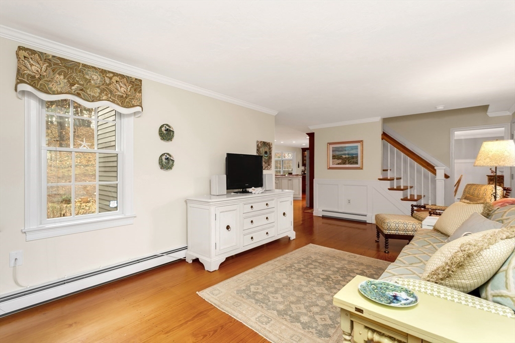 1 Delta Drive Franklin, MA 02038 - Photo 21 of 42 a living room with furniture and a flat screen tv