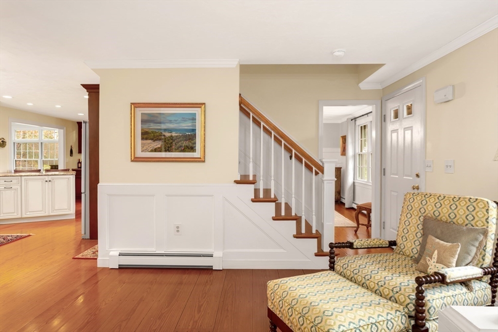 1 Delta Drive Franklin, MA 02038 - Photo 22 of 42 a living room with furniture and a wooden floor