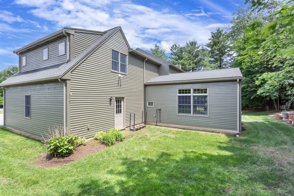 1 Delta Drive Franklin, MA 02038 - Photo 36 of 42 a view of a house with a yard plants and large tree