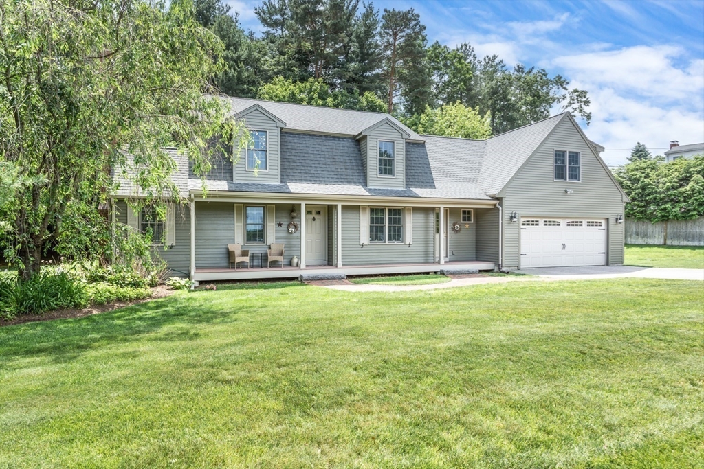 1 Delta Drive Franklin, MA 02038 - Photo 42 of 42 a front view of a house with a garden