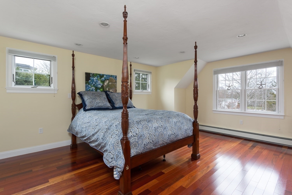 1 Delta Drive Franklin, MA 02038 - Photo 5 of 42 a bedroom with a bed and wooden floor