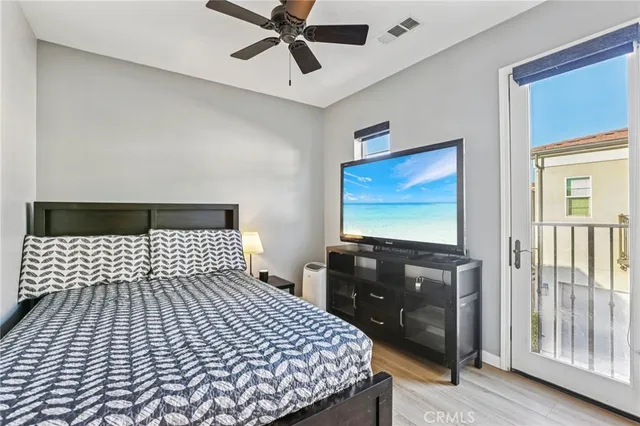 a patio with a patio table and chairs