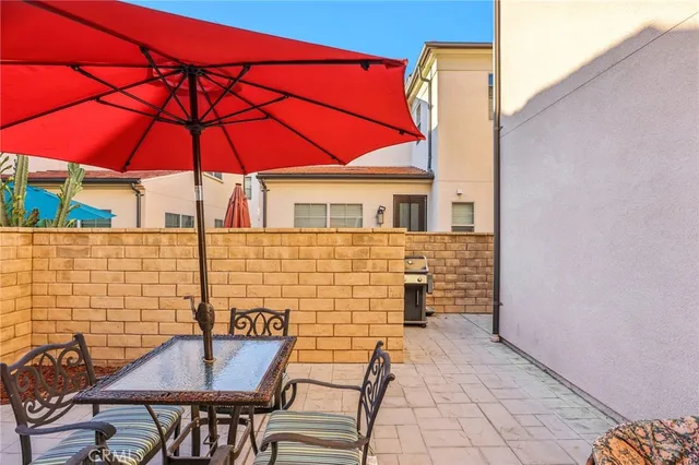 a bedroom with a bed and a table