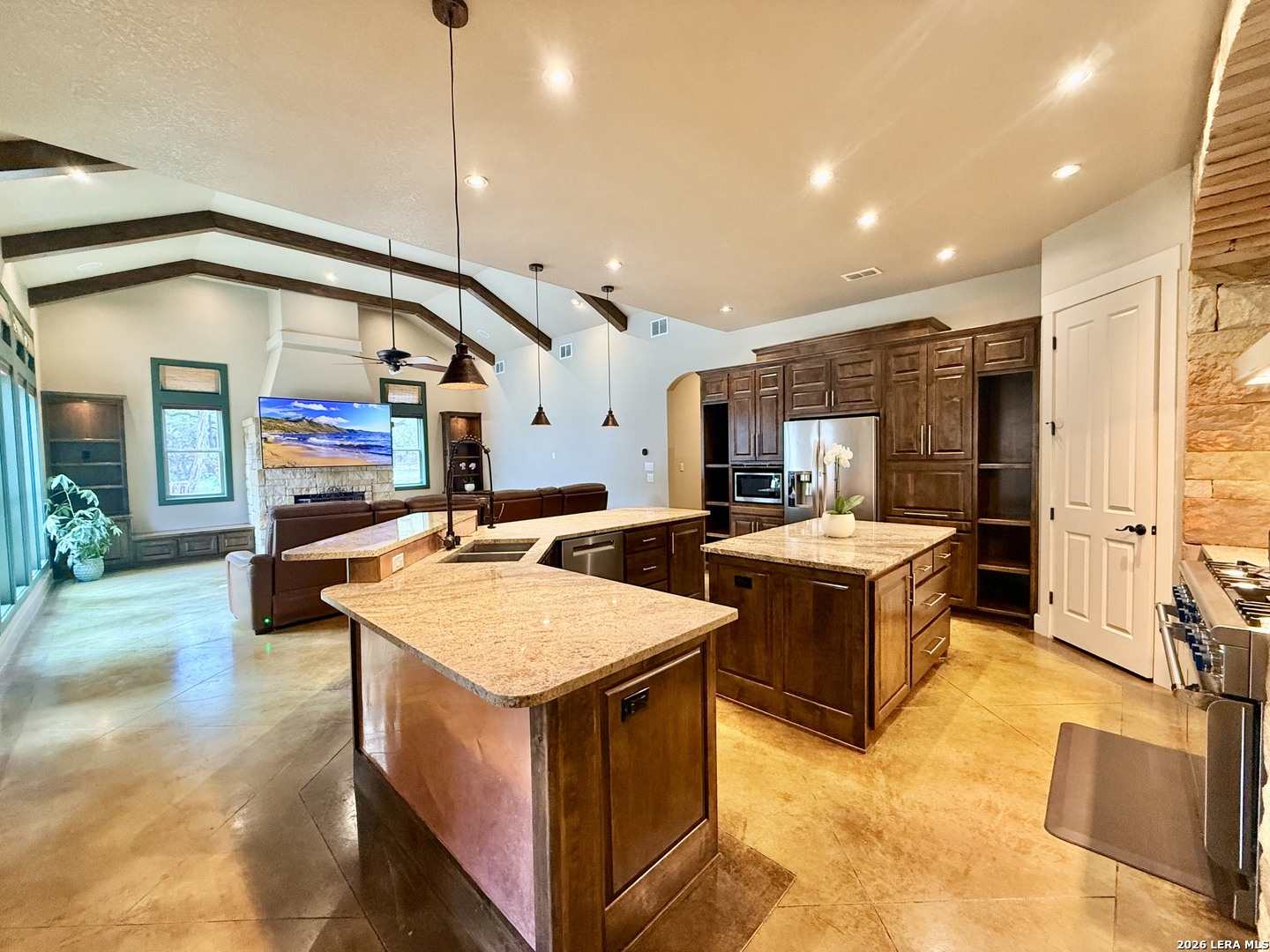 757 Copper Rim Spring Branch, TX 78070 - Photo 11 of 50 a kitchen with sink stove and refrigerator