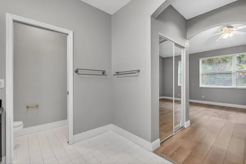 a view of an empty room and a window