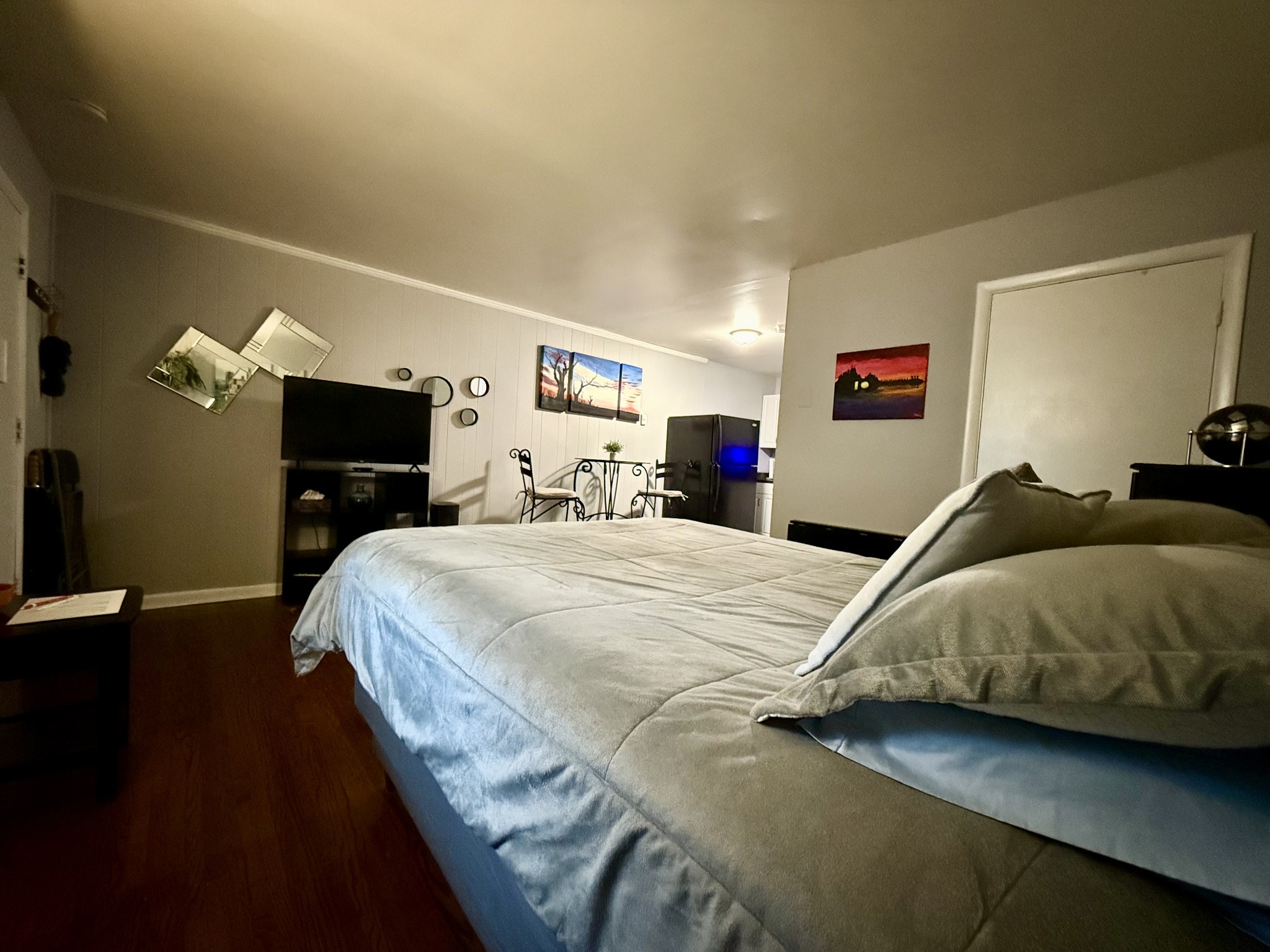 925 Boscobel Street, Unit 3 Nashville, TN 37206 - Photo 4 of 14 a bedroom with a bed and wooden floor